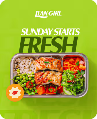 Meal container with rice, grilled salmon, peas, salad, and carrots under text ’Lean Girl Sunday Starts Fresh’.